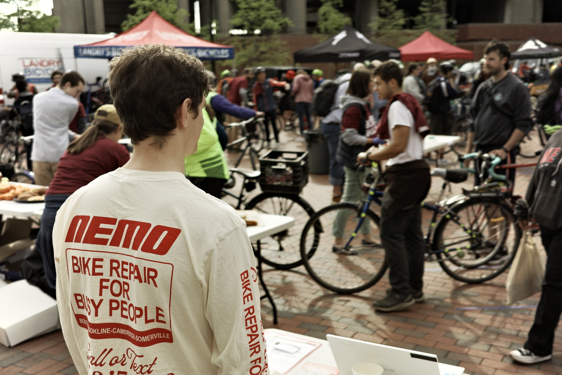NEMO team at a busy bike repair event at City Hall Plaza in Boston